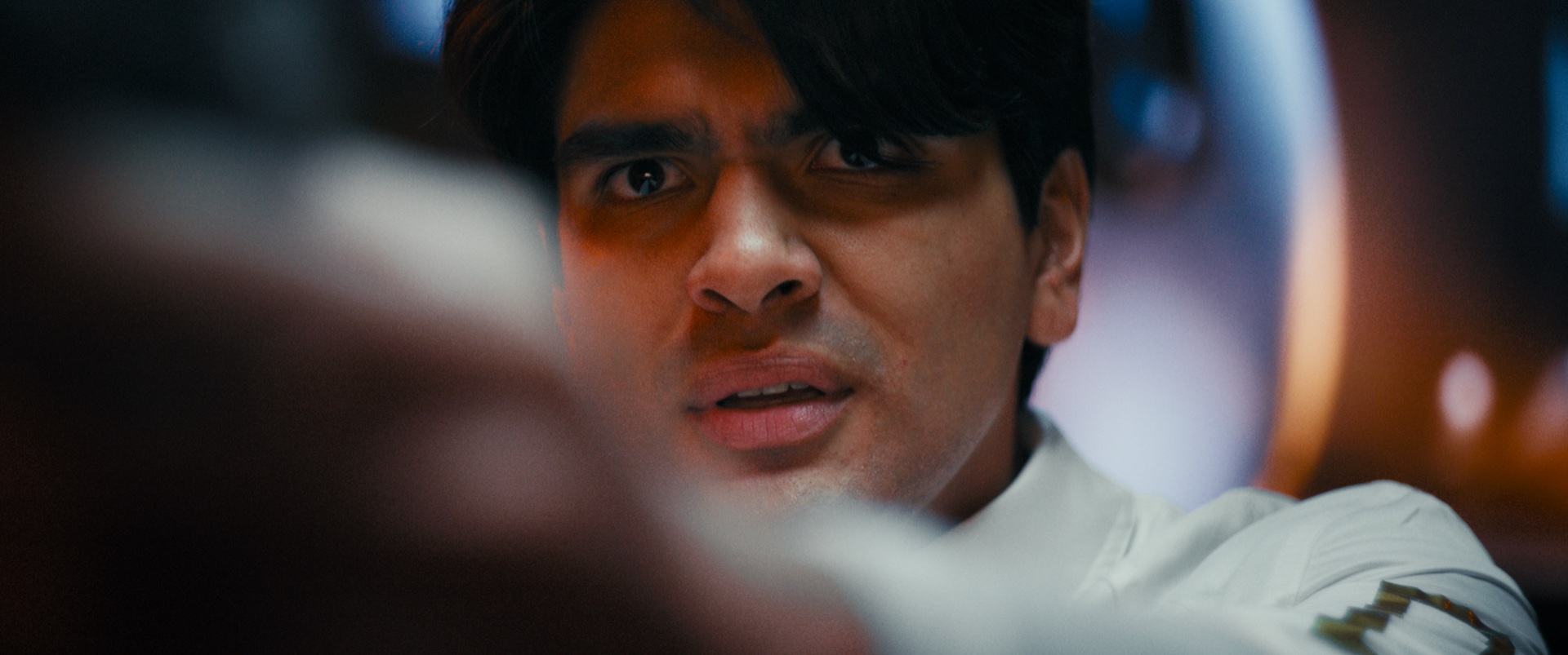 Genesis — Man in distress, cool blue tones