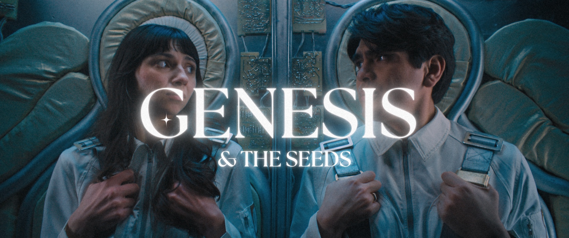 Genesis — Two characters in spacecraft, teal tones